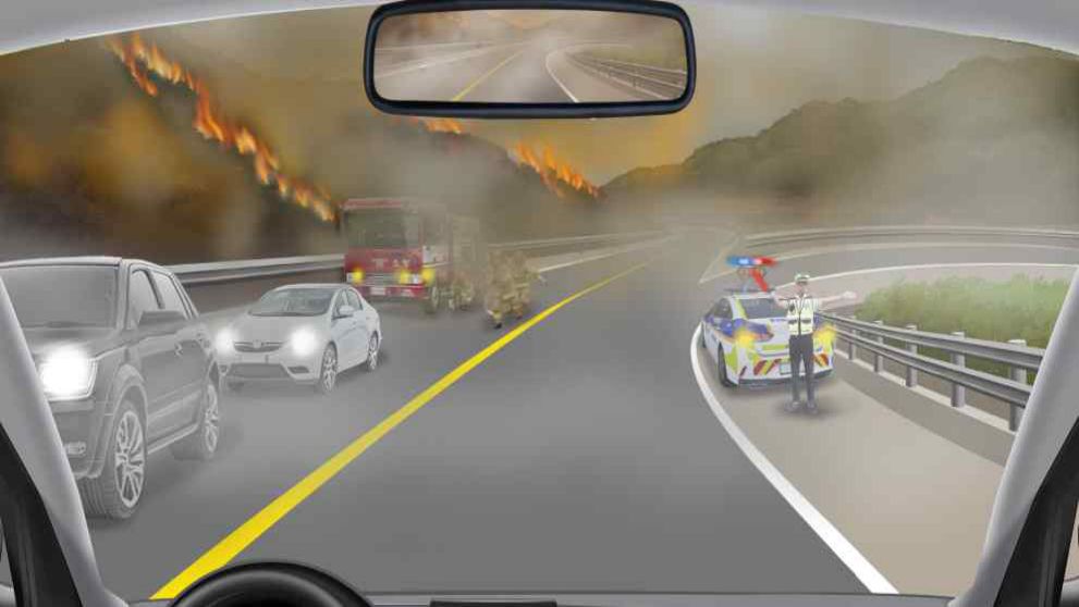 A forest fire ahead on the left · Visibility is poor because of the forest fire