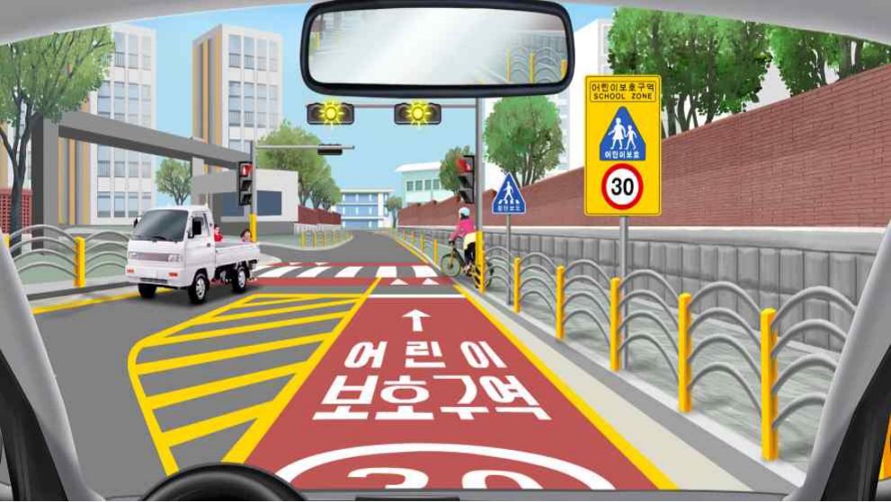 The traffic light is about to change from yellow to red