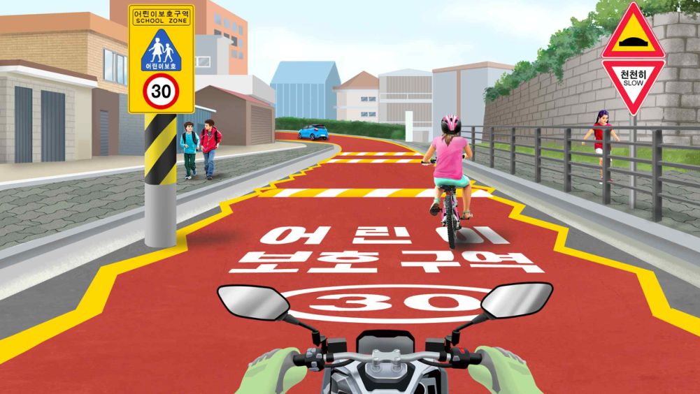 小学附近儿童保护区内的单行道路 · 在右侧边缘骑自行车在前面行进的儿童